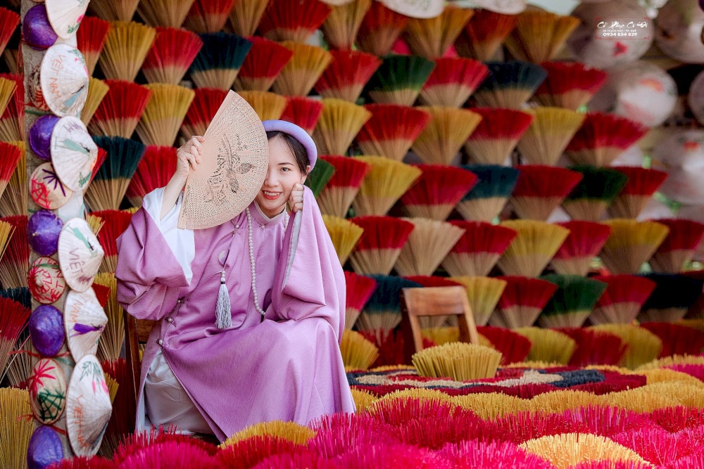 Experience a visit to Thuy Xuan Incense Village to admire its vibrant beauty and try making incense sticks by hand